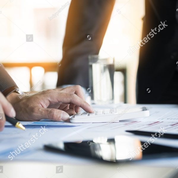 stock-photo-administrator-business-man-financial-inspector-and-secretary-making-report-calculating-or-checking-611939471
