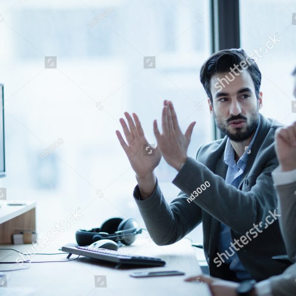 stock-photo-business-it-colleague-explaining-project-details-in-office-552213382